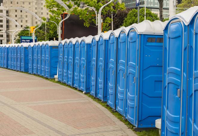 hygienic portable restrooms lined up at a beach party, ensuring guests have access to the necessary facilities while enjoying the sun and sand in Bay Springs MS